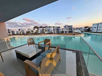 3BR chalet with panoramic open views first-row lagoon near delivery fully finished with ACs in North Coast near Dose Seashell Playa Marassi & Te