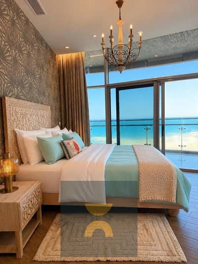 3BR chalet with panoramic open views first-row lagoon near delivery fully finished with ACs in North Coast near Dose Seashell Playa Marassi & Te