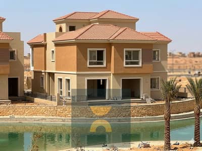 Luxury 5-bedroom villa in Sarai with panoramic lake views, 8-year installments or 50% instant cash discount, minutes from AUC, Madinaty & Bloomfields