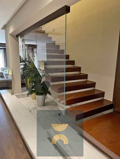 Corner townhouse with a prime layout for sale fully finished with installments over 15 years located on the Suez Road near Al Shorouk Patio Prime and