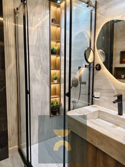 Fully finished apartment with 15-year installments or a 64% discount Prime location beside Sodic East on Suez Road near Al Burouj La Vista El Shoro
