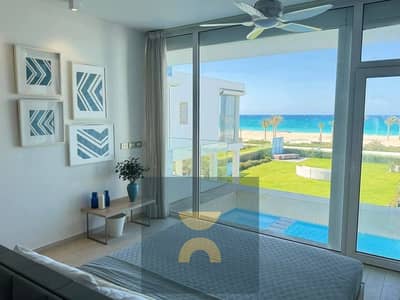 Two-bedroom chalet first row on Crystal Lagoon fully finished with air conditioning for sale Best location on the North Coast minutes from june sodic