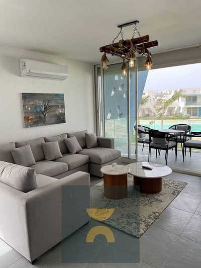 Two-bedroom chalet, first row on Crystal Lagoon, for sale in Ras El Hekma North Coast next to modon near Mountain View cali coast dose  La Vista