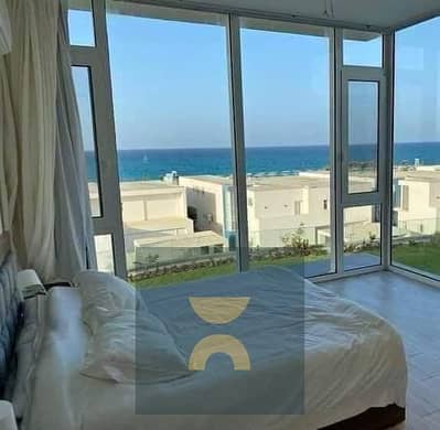 Two-bedroom chalet first row on Crystal Lagoon for sale in Ras El Hekma North Coast next to modon near Mountain View cali coast dose  La Vista
