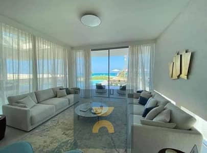 First row beachfront villa with hotel-style finishing and private pool for sale in Marsa Baghosh near Silver Sands Almaza Bay and Hacienda Modon