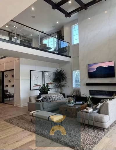 Ready-to-move corner townhouse in Taj City 3 floors 4 bedrooms fully finished near Creek Town Mountain View Rehab & Madinaty