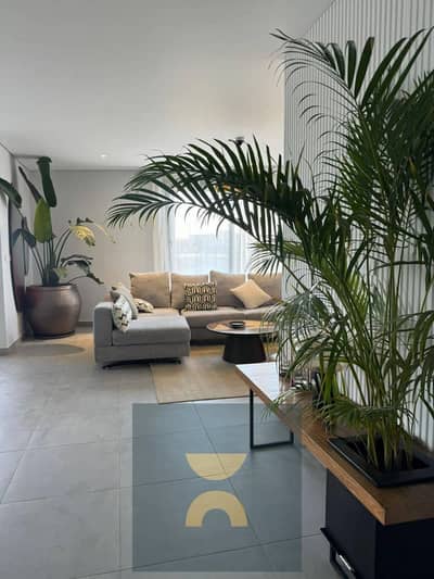 2 Bedroom apartment with a stunning double view 12-year installments or huge discount, on Suez Road minutes from AUC near Madinaty The Spine Tower