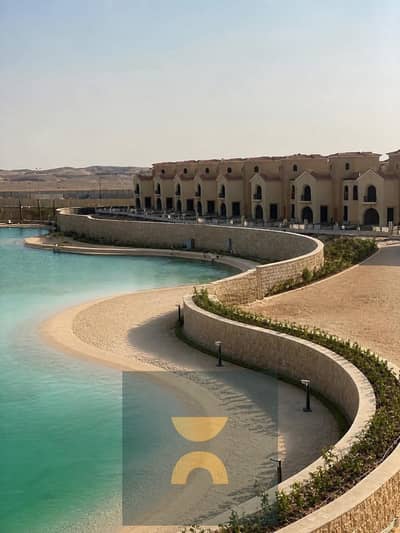 Luxury 5Bedroom Corner Townhouse with a stunning lake view 50% discount or flexible installments on Suez Road near Rehab The Spine Mountain View