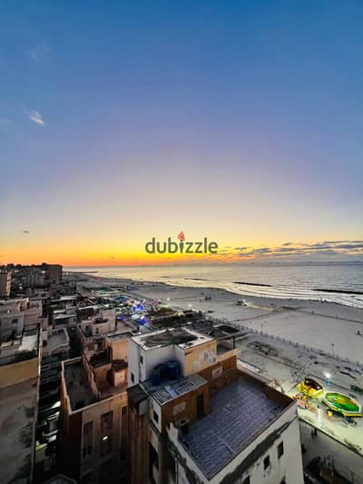 A flat in Al-Ajmi, Shati Al-Nakhil, with a full sea view, first number, high-quality finishing, registered and complete with the annex.