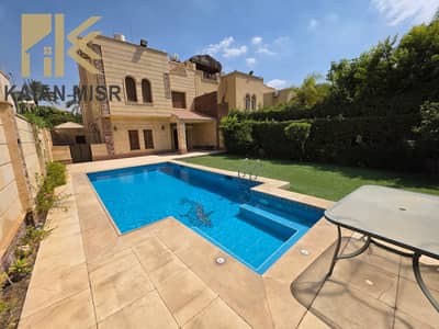 Twin House for sale in a prestigious compound in Al-Shorouk City, fully finished with a swimming pool