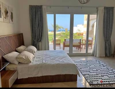For sale A ground floor chalet Ready To Move with a garden in the Blue Blue resort, Ain Sokhna. Located in a prime spot near the windmills