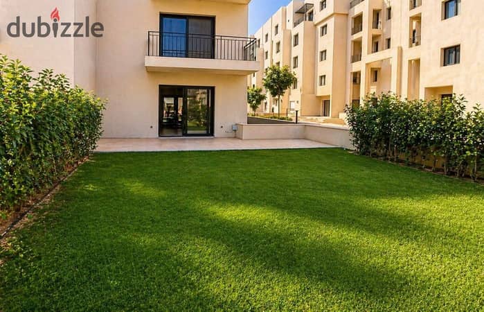 شقة بحديقة متشطبة بسعر مميز في او ويست مع اوراسكوم دقائق من نادي الجزيرة و اركان بلازا الشيخ زايد