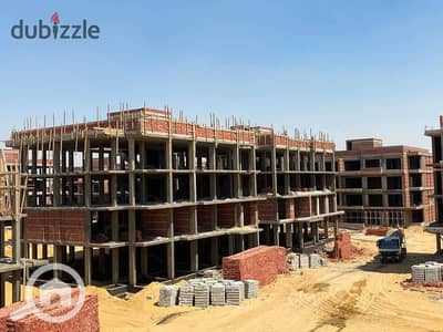 Apartment for sale in Lugar, Sheikh Zayed New directly in front of Asnifex Airport for installment over 10 years