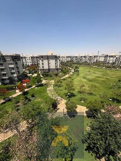 Apartment for sale open view on Central Park directly next to Madinaty and directly on the Suez Road minutes from the Fifth Settlement