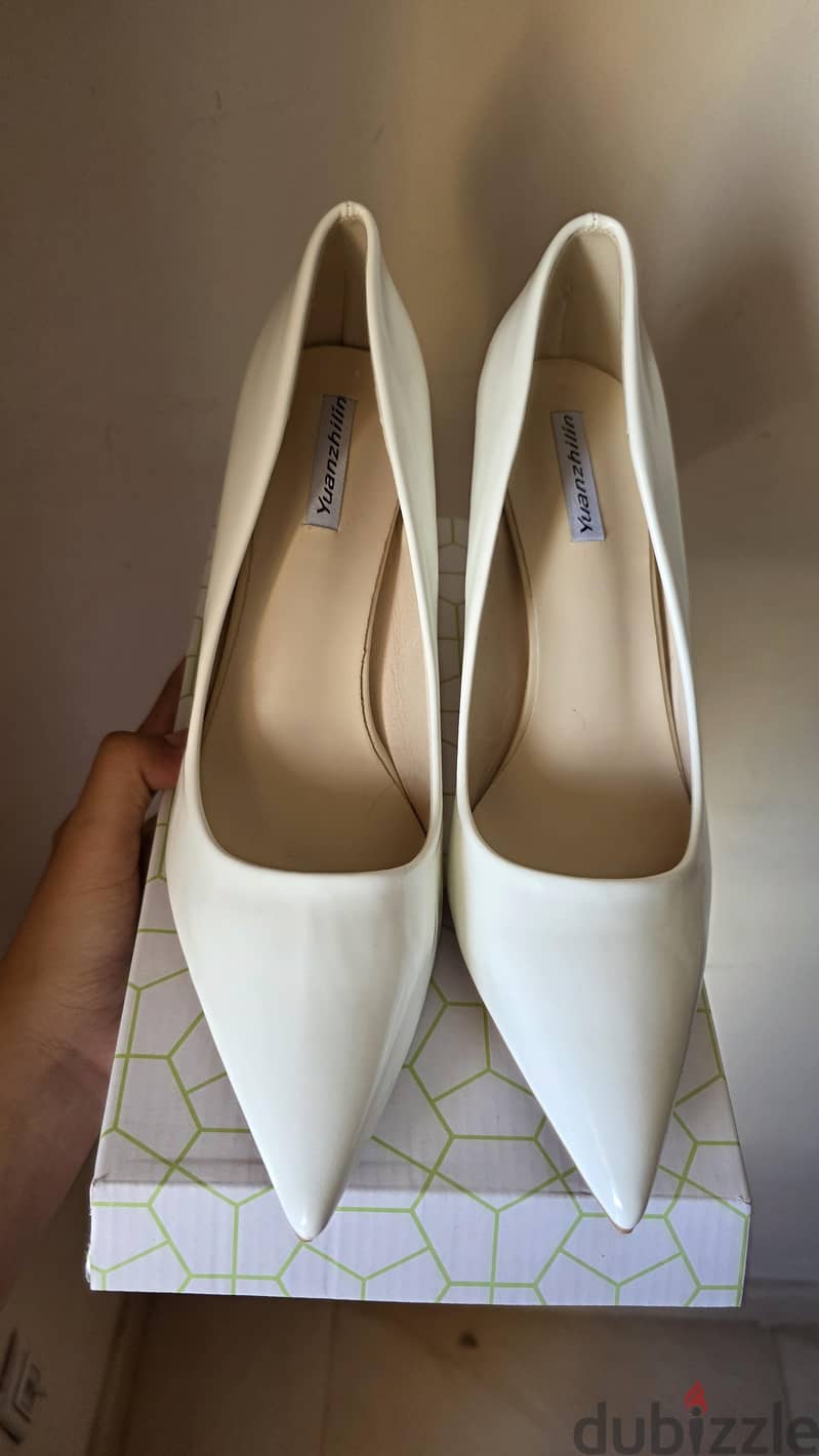 brand new never used white heels 1