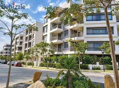 166 sqm resale apartment with a garden for sale at a below-market price in the Origami phase of Taj City, near Heliopolis and New Heliopolis.