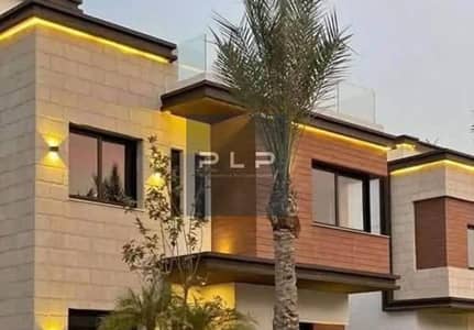 Townhouse available for ready to move at the lowest market price for a quick sale in the Azar compound, Fifth Settlement.