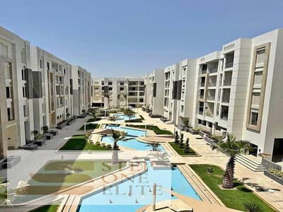The best opportunity to invest in a hotel apartment with a room and a reception in Al Jar Compound in front of Madinaty, under the management of the C