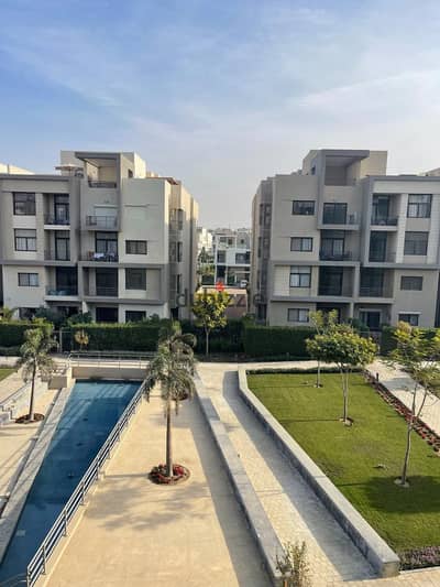Finished apartment for sale, including air conditioning, in Al Marasem Moon Residence compound.