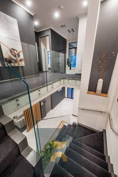 Luxury corner townhouse villa with lake view at a special price directly on Suez Road near Madinaty The Spine Eastvale SODIC and Mivida Gardens