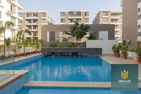 Apartment for sale in the Taj City compound (First Settlement), facing the Kempinski Hotel; available with a 10-year installment plan and views of the