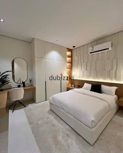 Two-bedroom apartment for sale with a cash discount, located directly on Suez Road opposite Cairo International Airport and near Heliopolis.