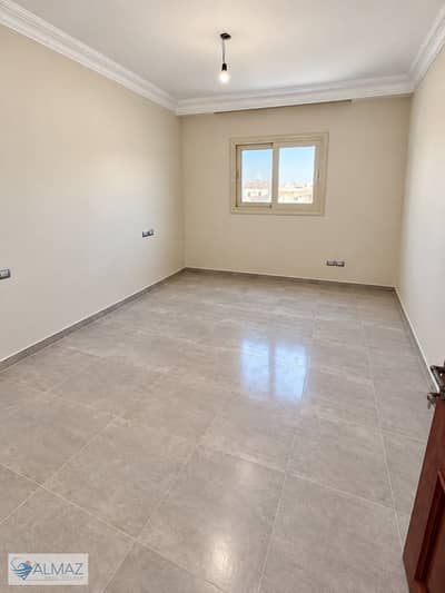 Unfurnished 150 sqm apartment for rent in the East Academy area (Sharq Al-Academy), First Settlement. Located near 90th Street and major service areas