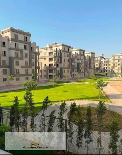 Ground floor apartment with garden for sale in Cairo University compound, directly on Waslet Dahshur Sheikh Zayed road.
