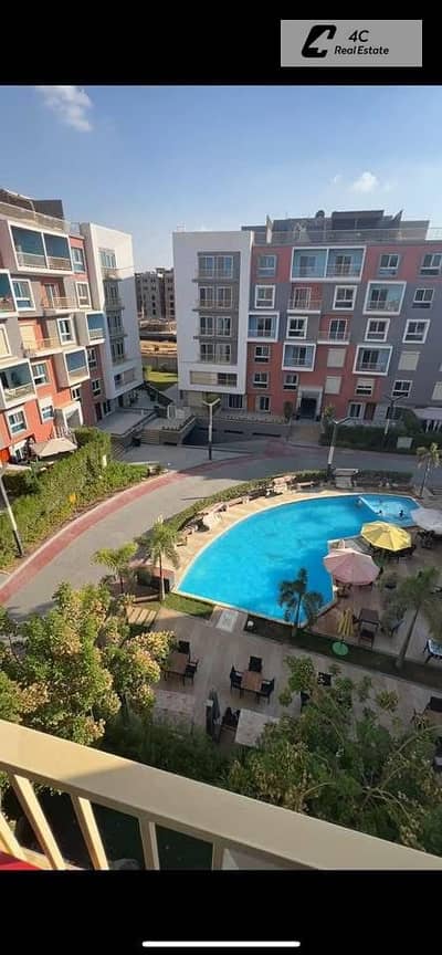 Under market price Apartment 155 m fully finished & furnished for sale ready to move very prime location View Pool in Amorada New Cairo