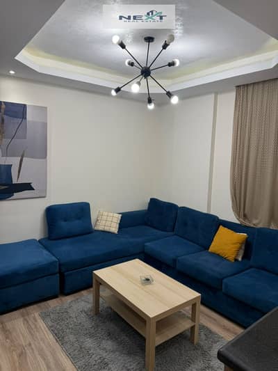Furnished studio for rent in Madinaty (B7), 50 sqm. Features custom finishes, a direct north-facing orientation, and an open view. Ideally located ver