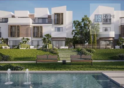 Townhouse available with a down payment and installment plan featuring a direct view of the Crystal Lagoon in Mostakbal City opposite Madinaty