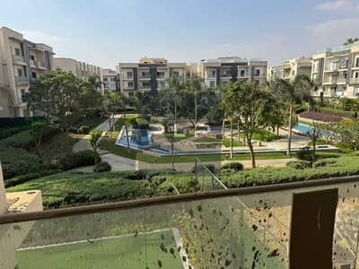 Fully finished apartment for sale with an open landscape view and ready to move, at the lowest market price, in Galleria Moon Valley Compound.