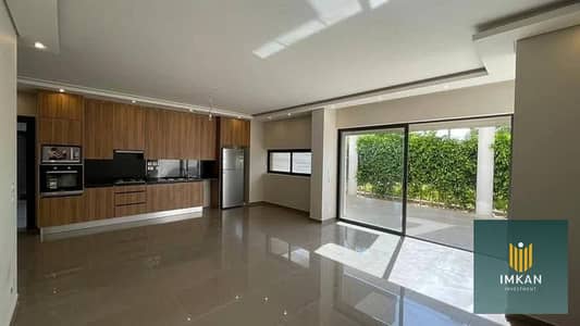 Fully finished ground-floor apartment with a garden for sale in the TALALA compound, New Heliopolis. Located adjacent to Sodic East and near El Shorou