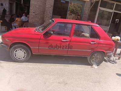بيجو 104 1