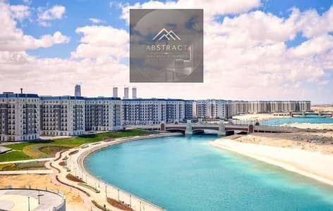 Apartment for sale, sea view, steps away from the lagoon, fully finished, ready for viewing in the Latin district of New Alamein City, North Coast.