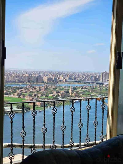 For daily and monthly rent hotel on the Nile, Corniche Maadi furnished apartment consisting of two bedrooms, reception, two bathrooms, and a fully air-conditioned kitchen, natural gas, wonderful view directly on the Nile from the twenty-fifth floor