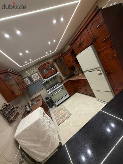 Furnished apartment for rent for upscale living in a distinguished location in One Katameya Compound, directly on the Maadi Ring Road, near all services, transportation, and Carrefour Circle, 5 minutes to Nasr City and New Cairo.