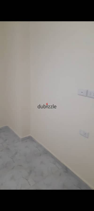 Apartment for sale in a prime location in Zahra Maadi, Al-Ma'raj Al-'Ulwi City, behind Emirates Gas Station, Egypt, just steps to Carrefour Ring Road, close to all services and transportation.