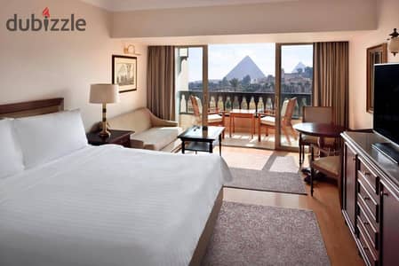 Hot Deal Opportunity Near the Pyramids  Touristic studio + Open Roof for sale at a price that won’t be repeated Located in a premium compound in Octob