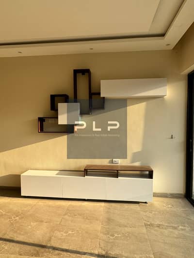 Ready to move with high-end ("Super Lux") finishing: a ground-floor apartment with a garden at an exceptional price in the Galleria Com