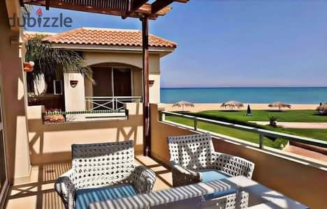 **First-Row Chalet for Sale Directly on the Sea in Telal El Sokhna, near La Vista and just minutes from Porto Sokhna. Fully Finished with Ultra Super