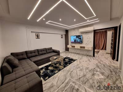 Furnished, air-conditioned hotel-style apartment next to City Stars, available for daily and monthly rent for families. Excellent location in Nasr Cit