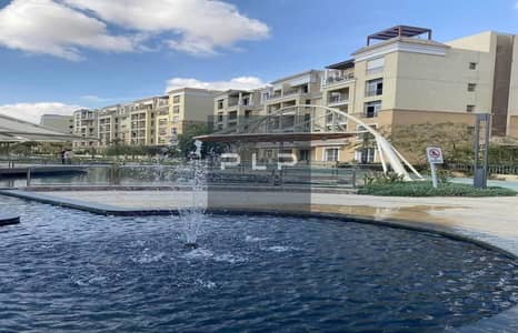 cheapest resale apartment with private garden with the lowest price for quick deal in Sarai croons prime location in new cairo minutes from Madinaty