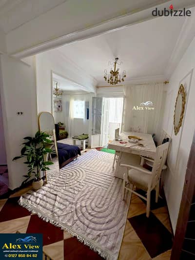 For sale, an authorized apartment in Sidi Bishr Bahri on Gamal Abdel Nasser, steps away from the sea