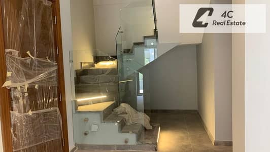 For quick sale: 4-bedroom duplex, fully finished and ready to move in, in Trio Gardens compound, minutes from the American University, open view