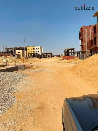 300 SQM Land for Sale in Badr City – El Takmely – Directly on Main Road – Fully Paid – Near Metro & Financial District