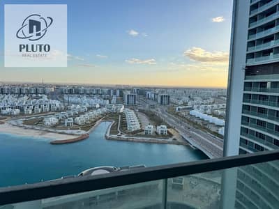 وحدة فندقية 121م بالدور 14 في أبراج ذا جيت العلمين الجديدة - Lake View بالفرش والأجهزة 