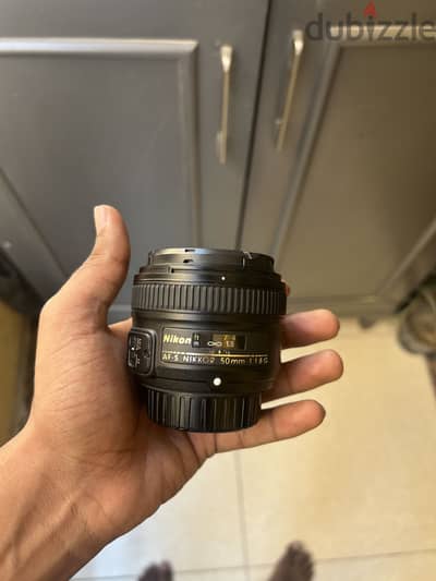 عدسة نيكون امNikon 50mm f/1.8G بحالة الزيرو / بحالة ممتازة