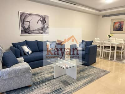 Furnished ground-floor apartment with a garden for rent in Cairo Festival City.