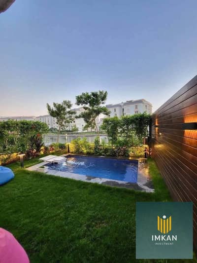 iVilla (265 sqm, finished) with a 120 sqm garden—immediate delivery—available for sale with an 8-year installment plan in Mountain View 1 Compound, lo